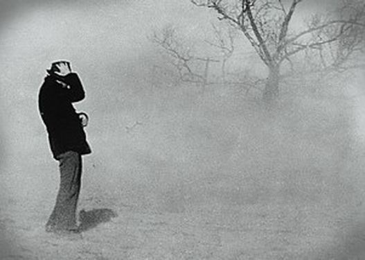 Image of man in a dust storm from the FDR Presidential Library archive: "In 1934 & 1936 drought and dust storms ravaged the great American plains and added to the New Deal's reflief burden."