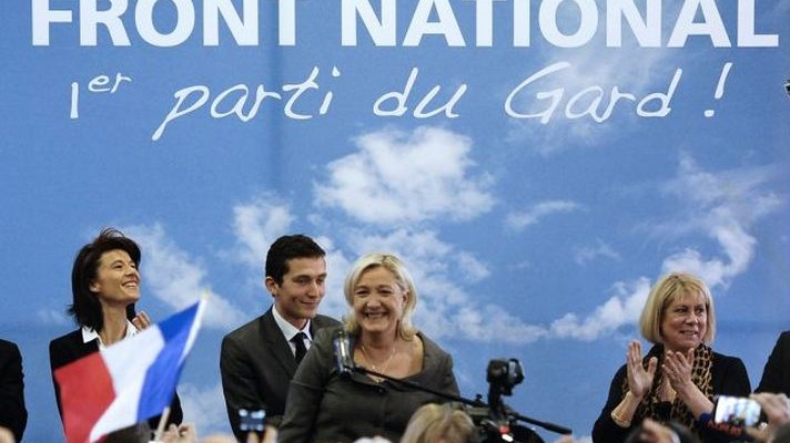 French far-right Front National (FN) party president Marine Le Pen (C) speaks during a political rally in Beaucaire in support of the local municipal FN candidate, on February 22, 2014.